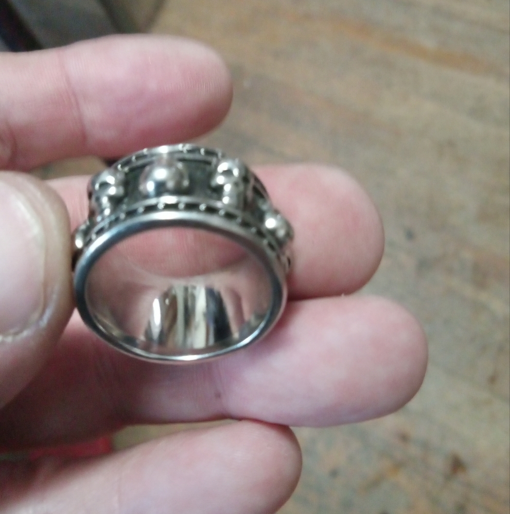 Stainless Steel Band Ring with Studded Skulls Design